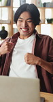 Happy, man and celebration with laptop in home for good news, college acceptance and success. Excited, asian student and fist pump with tech for university scholarship, study opportunity or milestone