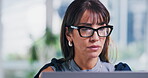 Serious, glasses and businesswoman with laptop in office, proofreading and editing story on website. Magazine editor, eyewear and mature person with tech for media publication, online and creative