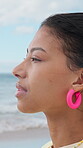 Thinking, peace or woman at seaside with fresh air, travel memory or mindfulness on summer break. Tranquil, reflection or tourist with breathing, vacation mindset or calm perspective on beach getaway