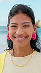 Face, beach and happy woman on holiday, summer vacation and laughing on tropical island. Portrait, funny and female person by ocean for travel, tourism and outdoor adventure with trip in Mexico