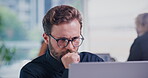 Review, glasses or man in firm with laptop, budget editing or insight for funding pitch. Tech, meeting or finance consultant in office with specs, expense evaluation or proposal ideas for investment.