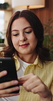 Woman, relax and scrolling with phone in home for network, connectivity or online app. Female person, user or browsing with smile on mobile smartphone for social media, communication or chat in house
