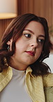 Serious, thinking and woman with worry on sofa for regret, ponder and reflection of mistake. Mental health, person with depression and thoughtful in home with stress, anxiety and doubt with decision