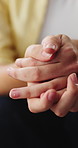 Nervous, hands or person with anxiety at therapy for PTSD, trauma counseling and stimming with worry. Mental health, closeup and patient in clinic with fidgeting, panic and contemplating appointment