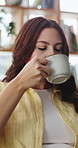 Relax, thinking and woman on sofa with coffee for calm, peaceful and inspiration in morning. Apartment, weekend and person with caffeine drink for reflection, thoughtful or daydreaming in living room