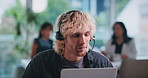 Headset, man and call center consultant in office with communication, crm or contact us. Mic, technology and male customer service agent with laptop for technical support consultation in workplace.