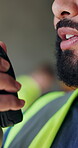 Speaking, mouth and construction worker with radio for contact, renovation site and building instructions. Talk, tech and man with property development update, infrastructure plan or maintenance info