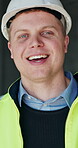 Construction, face or man on site with happiness, pride and experience as industrial worker. Smile, portrait or engineer on worksite with confidence, ambition and career in architecture industry.