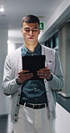 Walk, serious or man with tablet in hallway, review news article or proofreading story for online publication. Tech, journalism or editor with grammar check for draft, research or verify feature fact