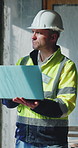 Construction, thinking and man on laptop in building for planning, research and online blueprints. Contractor, architecture and person on computer for renovation, maintenance and engineering project