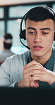 Laptop, speaking and man with headset in call center, customer care and online help desk for advice. Contact, tech support or hotline agent with troubleshooting assistance, client query answer or mic