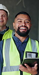 Happy man, face and team with tablet at construction site with confidence for real estate development. People, engineer and portrait with tech, application and smile for property expansion project