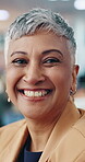 Realtor, face or mature woman in office with smile, career or ambition as property seller. Portrait, bokeh or real estate agent in workplace with laugh, confidence or experience in housing industry.