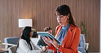 Tablet, reading and business woman in office or creative agency with editing for manuscript. Mature person, manager or editor with internet, tech and proposal with proofreading or app for grammar