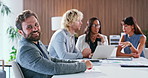 Face, man and meeting in office with journalist, confidence and opportunity or ambition. Confident, reporter and person with smile for career development, media and laugh in coworking newsroom