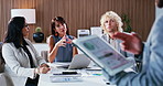 Presentation, tablet and business people in office with discussion, graphs or project collaboration for publishing. Meeting, digital tech and editor group with screen for feedback, review or advice