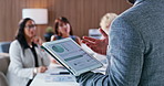Tablet screen, hand or businessman at presentation, meeting or risk management with investment data. Tech, team and discussion with presenter for graphs, review kpi or finance metrics in office