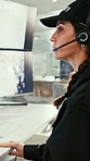 Security, video and woman with headset in control room, surveillance or serious with camera at night. Watching, screen and mature person with tech for communication, flare and protection services