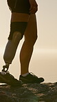 Athlete, sunset and prosthetic leg for hiking with fitness, workout and health with walk. Woman, nature and person with a disability outdoor for adventure, hobby and rehabilitation on mountain