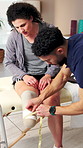 Physiotherapist, measure and leg of amputee woman for fitting, prosthetic limb and rehabilitation. Male physio, tape or person with disability for socket design, medical assessment and correct length