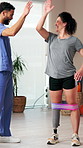 Physical therapy, high five and woman with prosthetic leg, stretching and excited for rehabilitation. Happy, patient and person with disability in clinic, exercise and celebration for health success