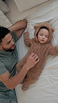Sleeping, father and baby in bedroom, above and tired with cuddle, relax and bonding together. Comfort, happy family and parent in home, growth and fatigue with love, dad and rest for infant care