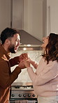 Couple, pregnancy and laugh with dancing in kitchen, holding hands and connection in home. Happy people, man and pregnant woman with rhythm, playful or support for prenatal development at apartment