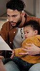 Document, baby and father in home, multitasking and remote work for creative project. Parent, child and dad in lounge, paperwork and research report for article, review submission and infant care