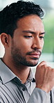 Serious, thinking and man with planning in office for growth vision, career mission and insight. Solution, person and reflection at workplace for company development, venture opportunity and decision