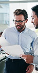 Discussion, documents and teamwork with business men in office together for planning or update. Collaboration, meeting and paperwork with happy employee people in workplace for project management