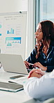 Business people, team and laptop with finance at office, review or discussion with charts at company. Men, women and computer for project with graphs, asset management and tech at investment agency