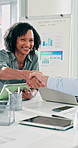 Business people, handshake and happy at office meeting with laptop, goals and success at insurance company. Woman, man and shaking hands with applause, thanks or celebration at risk management agency