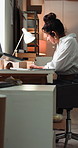 Box, laptop and writing with woman in logistics office for delivery or distribution tracking. Computer, notebook and supply chain with female courier in warehouse for shipping management or service
