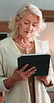 Woman, tablet and smile at ecommerce startup for supply chain, confirm order and shipping report. Mature person, reading and digital for stock checklist, inventory management and delivery information