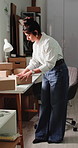 Woman, label and boxes at ecommerce startup for packaging, shipping details and order checklist. Timelapse, person and sticker on package for delivery address, inventory barcode and stock information