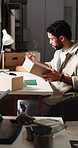 Logistics, scanner and man with package in office, parcel tracking and processing order for delivery. Writing, customs info and person with box check in dropshipping startup, distribution and tech