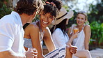 Friends, laugh or conversation in backyard with summer holiday, social gathering or bonding together. Happy, people and funny discussion outdoor at home with joke, connection or reunion for vacation.