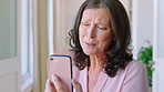 Video call, phone or woman in house with wave, connection or goodbye in online conversation. Happy, tech or mature person in home with friendly gesture, communication or farewell on digital app.