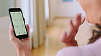 Woman, wave or video call with phone screen for conversation or online discussion in home. Female person, user or hands with mobile smartphone display or mockup for virtual chat, app or communication
