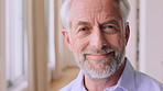 Wellness, face and old person in house with pride, positive attitude or chill on weekend break. Confidence, portrait or senior man in home with satisfaction, good mood or free time in retirement.
