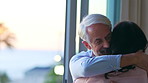 Home, dance and mature couple with hug for anniversary celebration, embrace together and smile. Man, woman and moving to music in house with spin for love, romance and holding hands with partner
