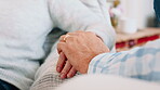 Support, holding hands or senior couple on sofa with care, comfort or bonding for retirement connection.  Love, compassion and elderly people together in nursing home, trust and security in marriage