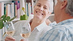 Senior, happy couple or laughing with champagne in home for weekend, holiday or retirement together. Elderly, man and woman with smile or glass of alcohol on sofa for anniversay or date in house