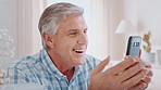 Phone, speaking and old man with video call in house, virtual contact or wave for digital communication. Hello, storytelling or senior person with smile for conversation, mobile app or talking online