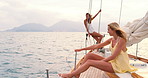 Friends, relax and women on yacht in ocean for vacation, tropical adventure and tourist destination. Happy, sailing and people on boat for cruise, journey and travel to islands on summer holiday