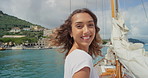 Face, woman and summer holiday on yacht with ocean, smile and travel adventure for outdoor getaway. Excited, female person and running on boat with journey, scenic view and tropical vacation at sea.