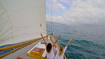 Back, freedom and friends with women on boat together for adventure, holiday or sea vacation. Arms raised, excited and space with happy people on luxury yacht for getaway, journey or ocean trip