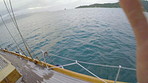 POV, boat and person diving in ocean for vacation, adventure and exploration on summer holiday. Sailing, tourist and jump in sea from ship for swimming underwater, travel and splash with freedom