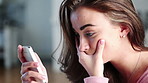 Woman, concern and stress with phone in home for bad news, emotional anxiety or mental health. Frustrated, worry or female person with depression on mobile smartphone app for rumor, gossip or mistake