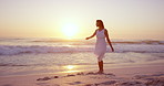 Travel, sunset or woman at beach with dancing, carefree or peaceful perspective on ocean vacation. Space, seaside waves or tourist with movement, calm mindset or summer evening on holiday break.